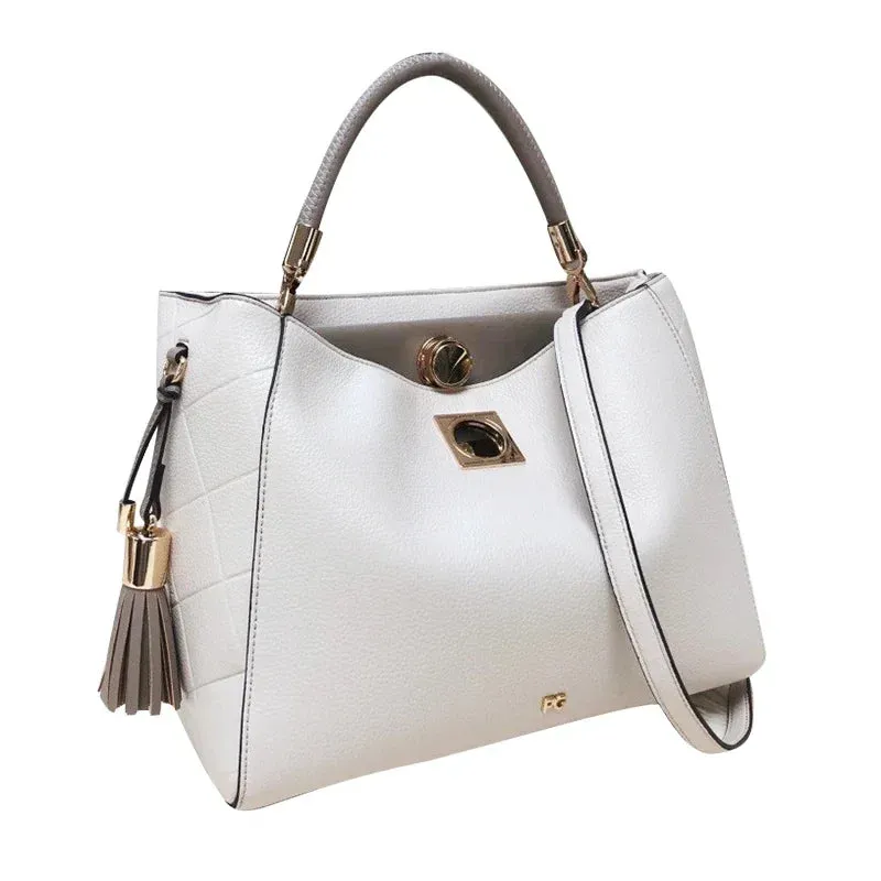 PG Fashion Elegant Popular Ladies Handbag Can Crossbody Niche Bags Unique Skeleton Buckle with Tassel Pendant New Brand Design